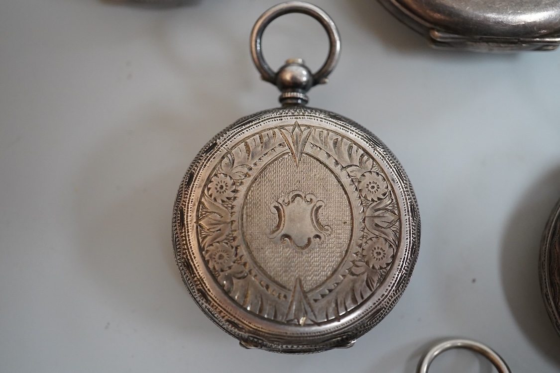 An early 20th century silver open faced pocket watch, with Arabic dial and subsidiary seconds, together with four other white metal open faced fob watches and a white metal half hunter pocket watch, case diameter 44mm.